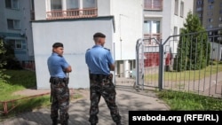 Belarusian police officers during a raid on the BelaPAN news agency in Minsk on August 7. 