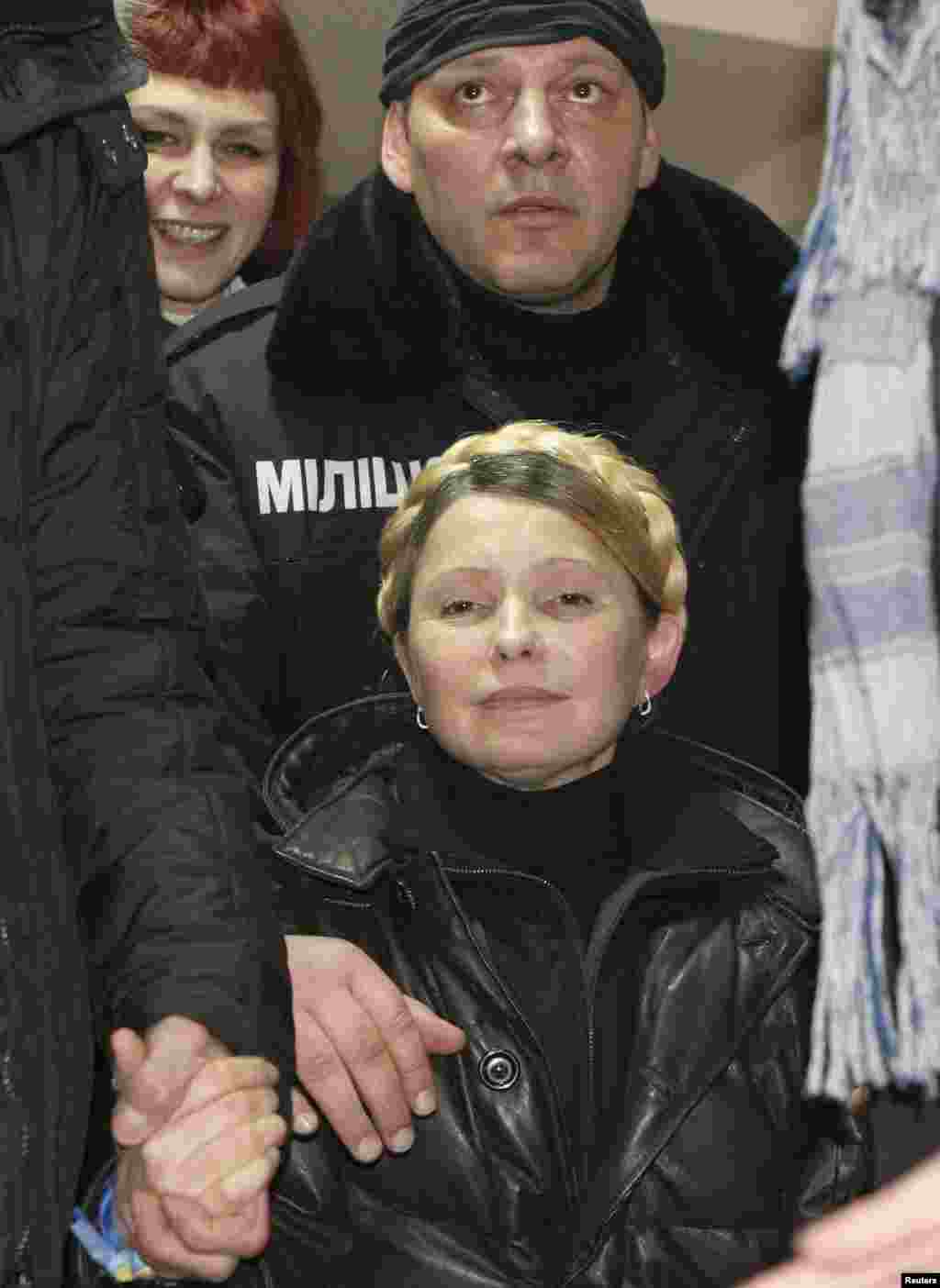 Tymoshenko was held under guard in a prison hospital where she was being treated for severe and chronic back pain. 