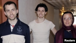 Sarah Shourd, right, and her still-detained companions Shane Bauer, left, and Joshua Fattal have not met with their lawyer, Masud Shafie, since September.