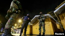 Belgian soldiers patrol in Brussels late on November 21.