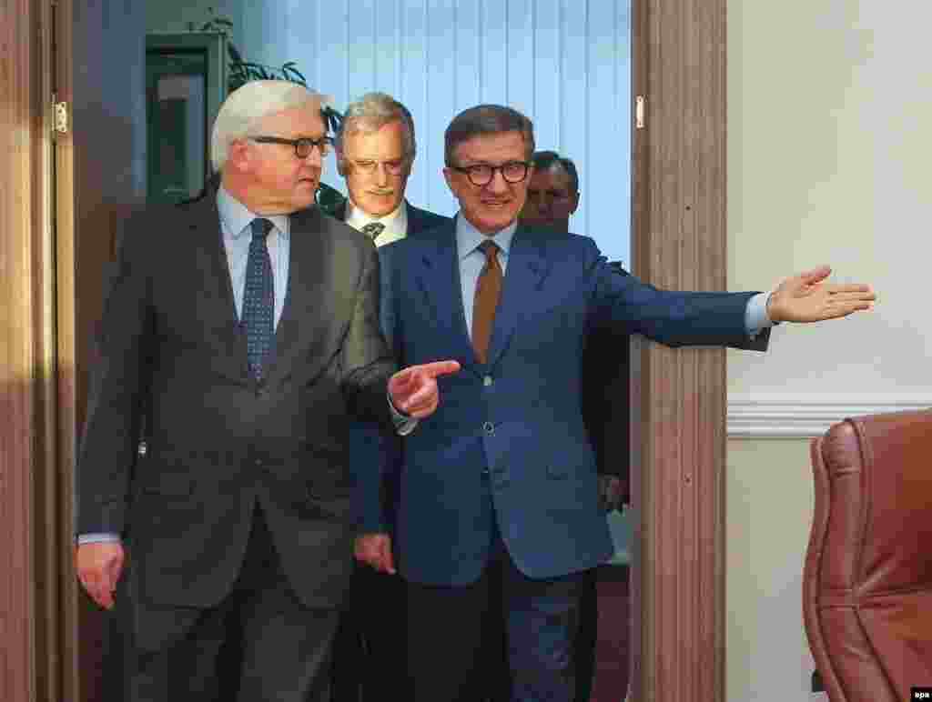 Akhmetov, despite serving as a parliament deputy, rarely embraces political roles, and most recently turned down the job of governing the Donetsk region. In his place, he recommended a political nemesis, Serhiy Taruta, a Tymoshenko ally and a longstanding voice for Ukrainian unity. Taruta (right) meets with German Foreign Minister Frank-Walter Steinmeier in Donetsk on March 22. 