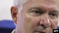 U.S. Secretary of Defense Robert M. Gates briefs the press on his way to Europe.