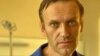 Poisoned Kremlin Critic Navalny Told To Return To Russia Or Face Jail