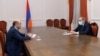 Armenian Prime Minister Nikol Pashinian (right) met with Edmon Marukian, the leader of the Bright Armenia opposition faction on March 4. (file photo)