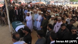 Relatives, residents and government officials offer funeral prayers for slain Pakistani exchange student Sabika Sheikh, who was killed during a school shooting in Texas, following her body's arrival from the United States in Karachi on May 23.