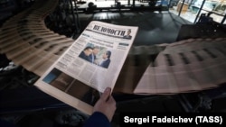 Vladimir Putin's Russia will mark World Press Freedom Day on May 3 with its leading business newspaper, Vedomosti, fighting for its independence.
