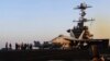 Image taken from video provided by the US Navy shows an aircraft launching from the USS Harry S. Truman in the Red Sea before air strikes in Sanaa, Yemen, on March 15.