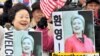 North Korea Warns Of War As Clinton Heads For Seoul