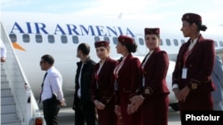 Armenia -- Air Armenia crew prepare for the company's inaugural flight from Yerevan's Zvartnots airport, 23 October 2013.
