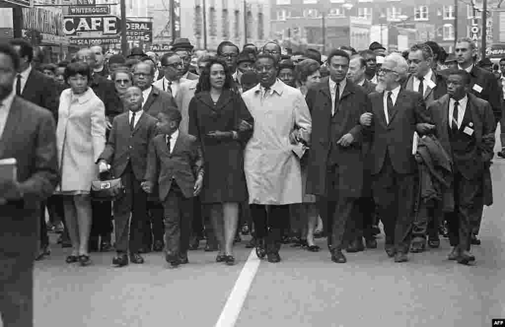 Coretta Scott King (fifth from right) leads the March on Memphis on April 9, 1968, five days after her husband, Martin Luther King Jr., was assassinated in Memphis, Tennessee. On her right, the couple's daughter, Yolanda, walks with her brothers Martin and Dexter.