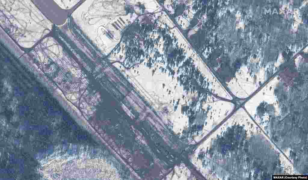 The scarred land around the Zyabrauka airfield in Belarus on February 15 shows where troops and equipment have departed.&nbsp;Maxar states that large ground forces recently deployed to this airfield are unaccounted for.&nbsp;