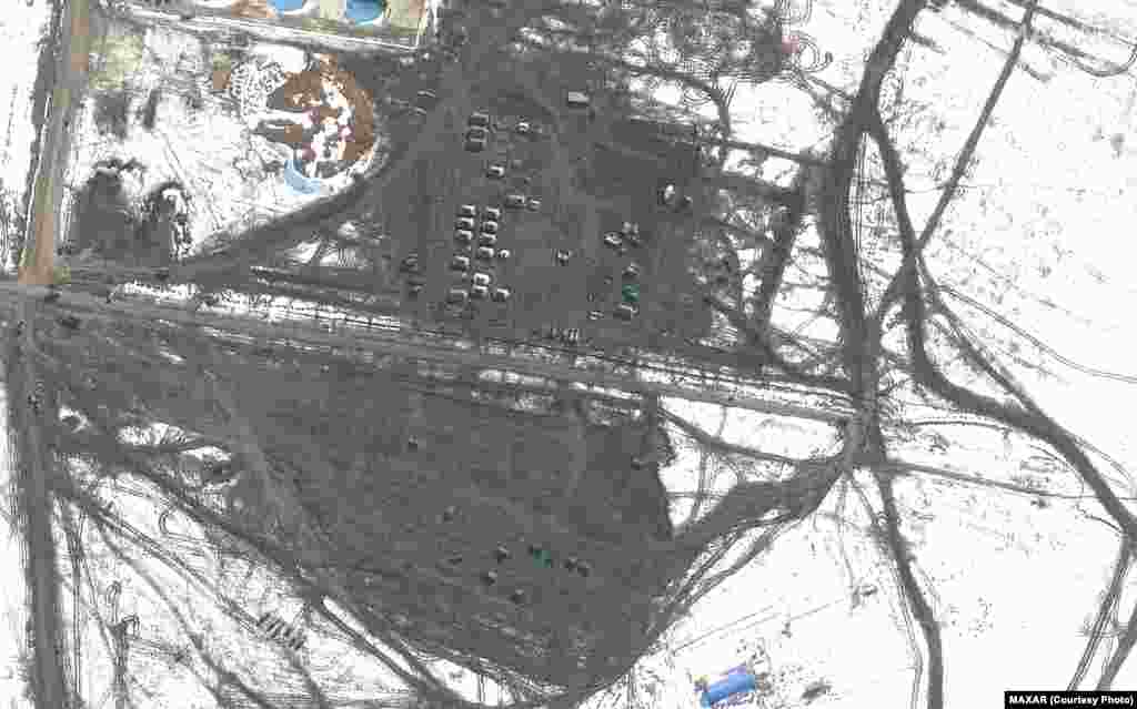 An area in Soloti, Russia, after the departure of a battle group. Extensive vehicle tracks can be seen.