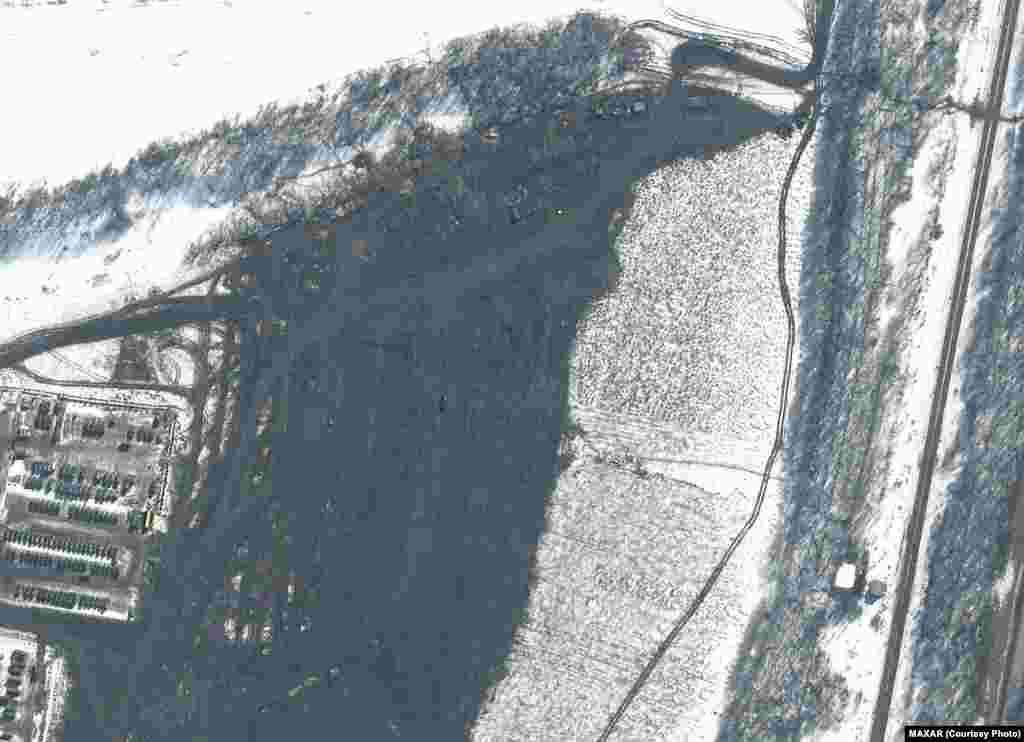 This satellite image shows troops departing and the deployment of a battle group in Soloti, Russia, on February 20, 2022, according to Maxar Technologies. 