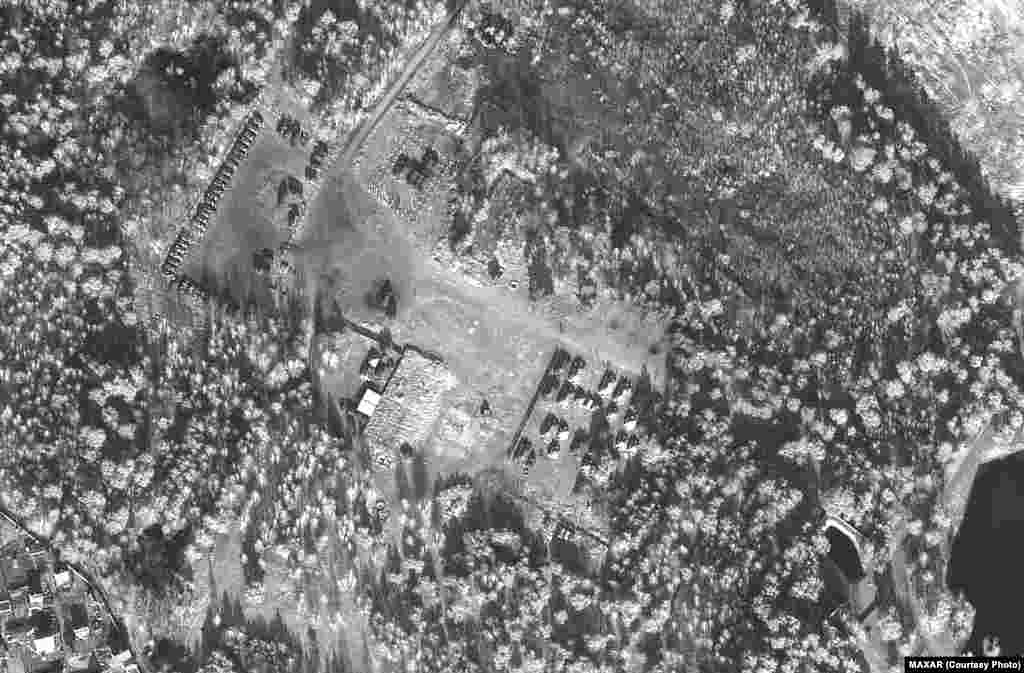 A satellite image shows troops and equipment at the Brestsky training area in Brest, Belarus, on February 16. Maxar analysts say self-propelled artillery units continue to conduct training in the area and troops and equipment are positioned at the nearby Brest rail yard.&nbsp;
