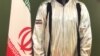 Monkeying Around? Iranians Ridicule Official For Posting Halloween Costume As Astronaut's Suit