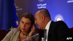 მევლუდ ჩავუშოღლუ და ფედერიკა მოგერინი