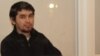 Саян Хайров, обвиняемый в терроризме, в день оглашения приговора по его делу. Алматы, 7 ноября 2013 года. 
