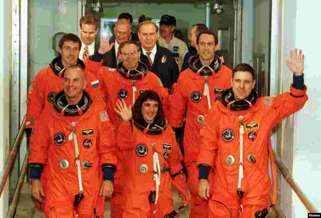 The crew of the space shuttle "Endeavour" departs from their crew quarters for launch pad 39A at the Kennedy Space Center in Florida, early on the morning of December 3, 1998.