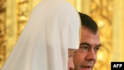 Patriarch Kirill and President Dmitry Medvedev in the Kremlin.