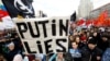 People attend a rally to protest against the tightening of state control over the Internet in Moscow on March 10.