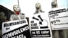 Supporters, Anti-Radar Protesters Greet Obama