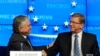 Belgium -- EU Commissioner for Enlargement Stefan Fule (R) and Armenian Foreign Minister Edward Nalbandian shake hands during a press conference at the EU Headquarters in Brussels, December 9, 2013