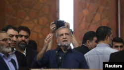 President-elect Masud Pezeshkian speaks to supporters at the shrine of Iran's late leader, Ayatollah Ruhollah Khomeini, on July 6.