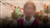 38-летняя жительница Ошской области на вечере выпускников, которую позже застрелил муж. Лицо скрыто по этическим соображениям. 
