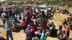 Syrian Kurds Pour Into Iraq's Kurdish Region