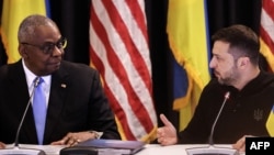 U.S. Secretary of Defense Lloyd Austin and Ukrainian President Volodymyr Zelenskiy attend a Ukraine Defense Contact Group meeting in September at the U.S. air base in Ramstein, Germany. 