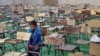 Taliban Says It Will Open Afghan Schools