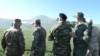 Foreign military attaches visit an area in Armenia's Syunik Province where Armenian and Azerbaijani troops are locked in a border standoff on May 20.