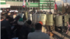 Several protesters suffered injuries in a melee that ensued when police tried to break up the unsanctioned rally. 