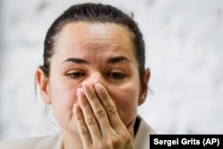 Presidential candidate Svyatlana Tsikhanouskaya reacts during a news conference after the Belarusian presidential election in Minsk on August 10, 2020.