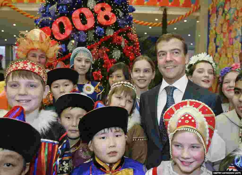 In 2005, Putin appointed Medvedev first deputy prime minister, giving him the power to implement large domestic projects. In this 2007 photo, Medvedev smiles at the All-Russian New Year's Party at the Kremlin. 