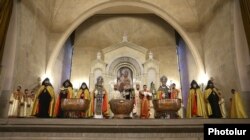 The supreme head of the Armenian Apostolic Church, Catholicos Garegin II (center), says Christmas Mass at St. Gregory the Illuminator Church in Yerevan. (file photo)