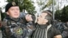 Belarusian Police Break Up Preelection Demonstration