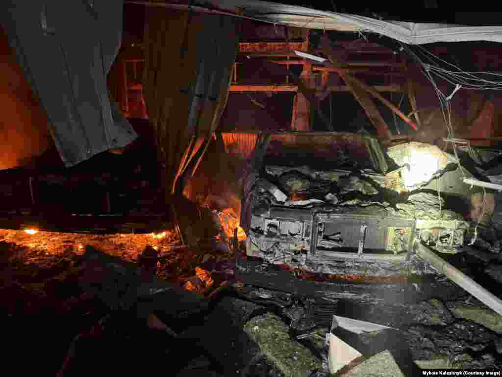 A destroyed car that appears to be a vintage Soviet-made ZiL in Yanukovych's collection. The damage to Yanukovych's vintage car collection came as a result of what the Kyiv authorities say was "debris" that fell amid the Russian drone attack. 