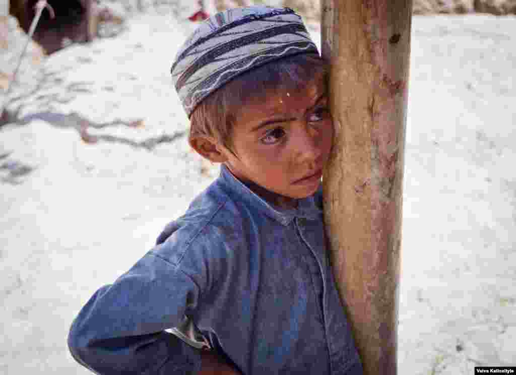 Khalid, 8, fled with his family from their home in Samangan Province.
