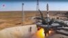 A Russian Soyuz rocket lifts off from the Baikonur Cosmodrome in Kazakhstan on August 9, carrying an Iranian Khayyam satellite into orbit.