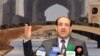 Iraq Panel Reinstates Election Ban