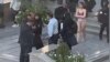 Iranian authorities arrested the female student after she stripped to her underwear on the street outside the university. 