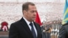 Former Russian President Dmitry Medvedev takes part in a wreath-laying ceremony at the Tomb of the Unknown Soldier on Defender of the Fatherland Day in Moscow on February 23. 
