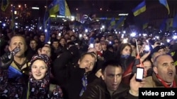 Ukraine - protesters on Independence Square in Kyiv sing the national anthem. roundup screen grab Euromaidan Euromaydan