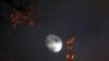 Russia -- The moon is seen behind the crescent of the Yaroslavl Central Mosque, 29Nov2012