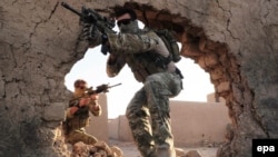 President Barack Obama says soldiers still face "tough fight" in Afghanistan.