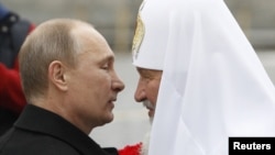 Патріарх Московський Кирило і президент Росії Володимир Путін