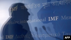 The International Monetary Fund has urged U.S. monetary authorities to consider how they would unwind emergency measures taken to push down interest rates and fight the downturn.