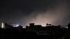 Dust rises from the site of US strikes in Sanaa, the Yemeni capital, on March 15.