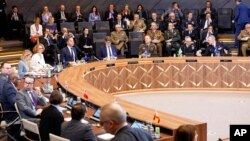 NATO foreign ministers meet in Brussels on April 4.